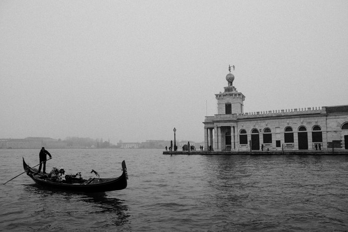 Black and white image of a gondola in Venice