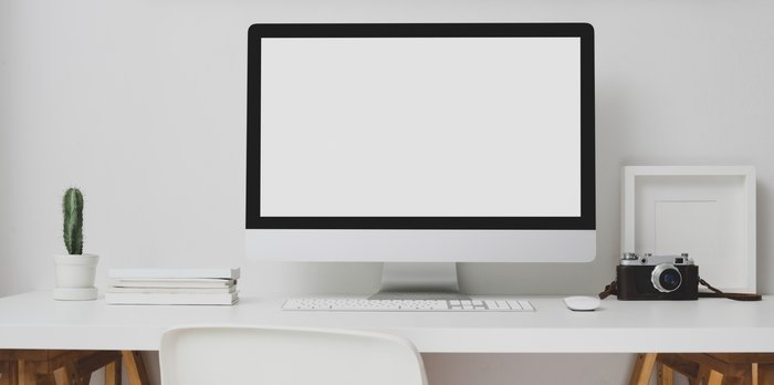 A laptop on a home office desk