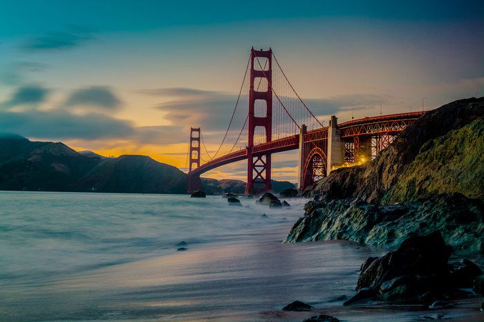 A bridge over a coastal scene