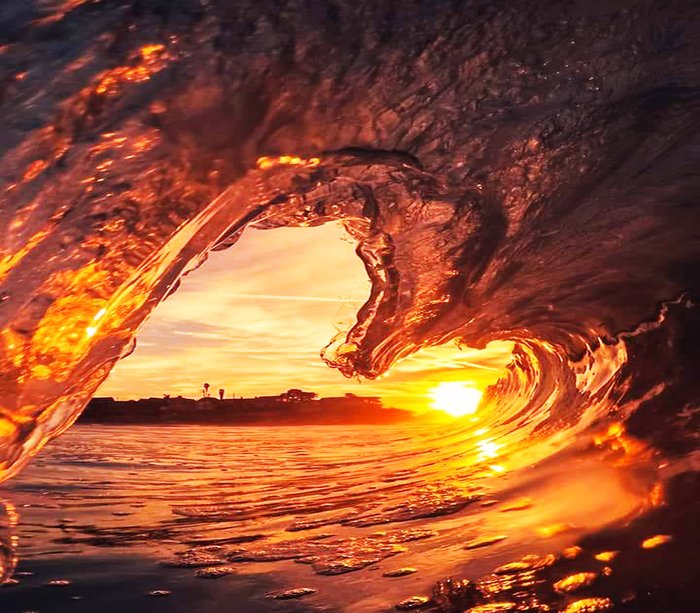 Cool seascape shot through a wave at sunset