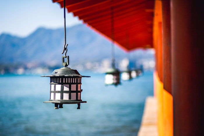 Lanterns on the site of a building by the ocean