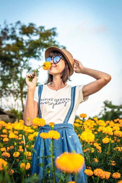 A girl in a field of flowers