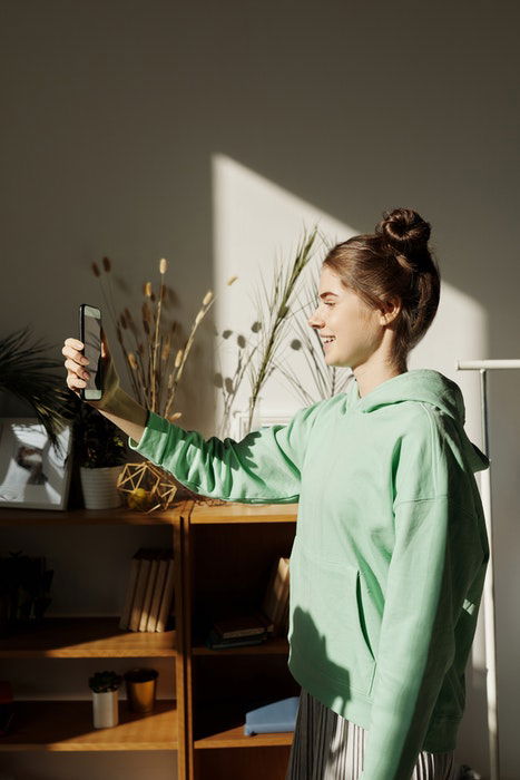 A girl taking a self portrait