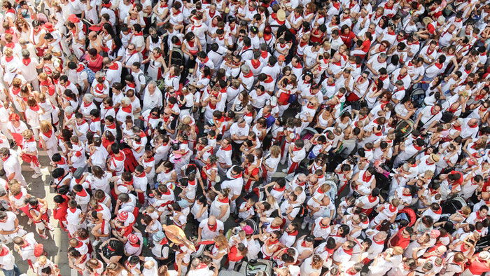 A large crowd scene shot from a birds eye view perspective