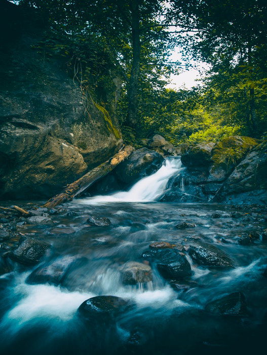 long exposure image of waterfall and rapids