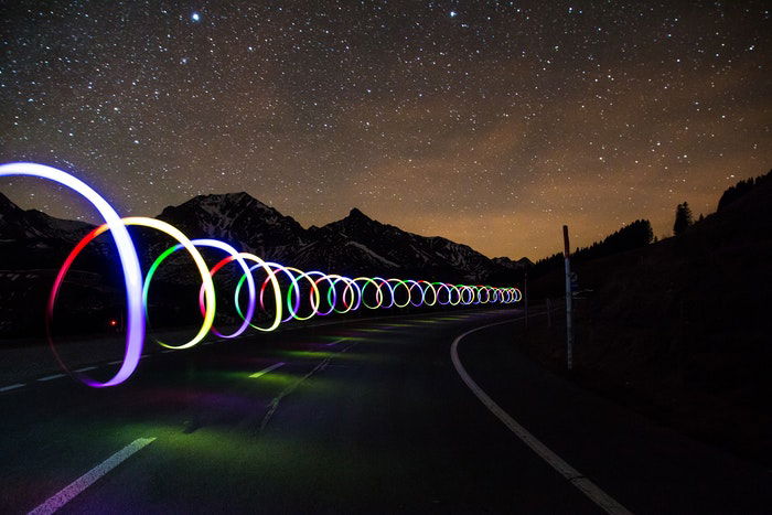 iPhone image of light painting on a nighttime road