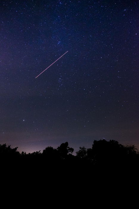 long exposure of a meteor shower at night