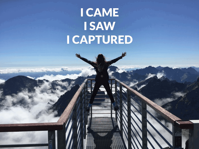 Photo of a person on a mountaintop overlayed with a photography pun