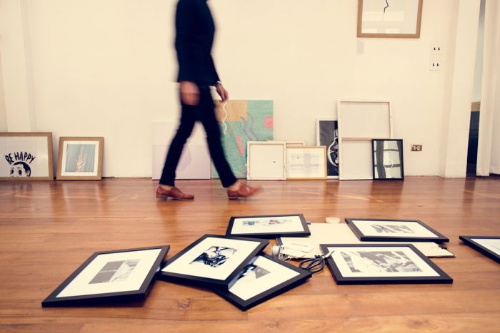 Photo frames on wooden floor