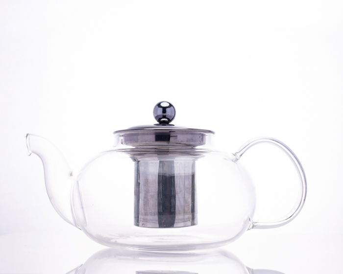 teapot with black stripe down metal surface