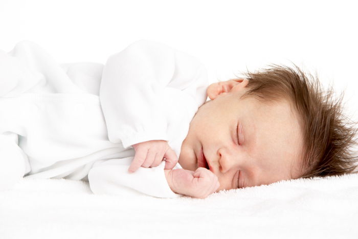 Baby Sleeping on side on blanket