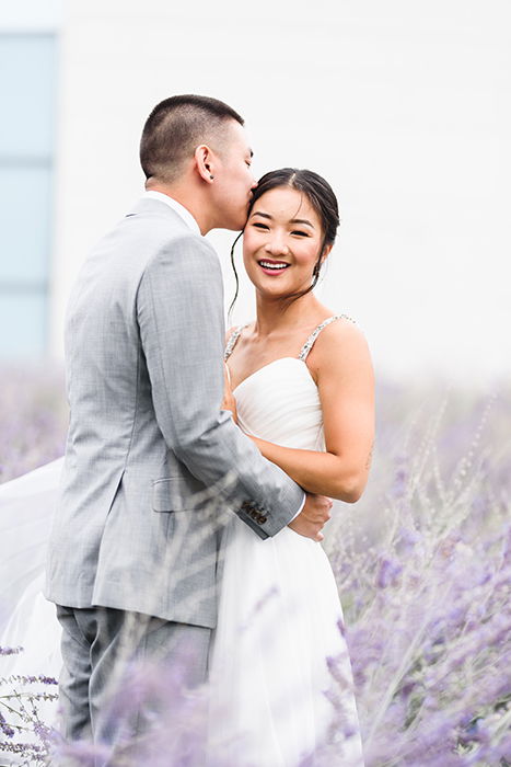 Young couple at their wedding photographed with the Sigma 85mm f/1.4 Art lens