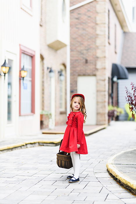 Photograph of a girl in a red dress taken with the Sigma 85mm f/1.4 Art lens