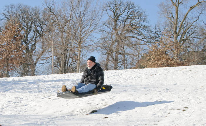 Santa sliding down a hill