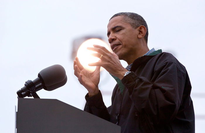 Barack Obama holding a ball of light