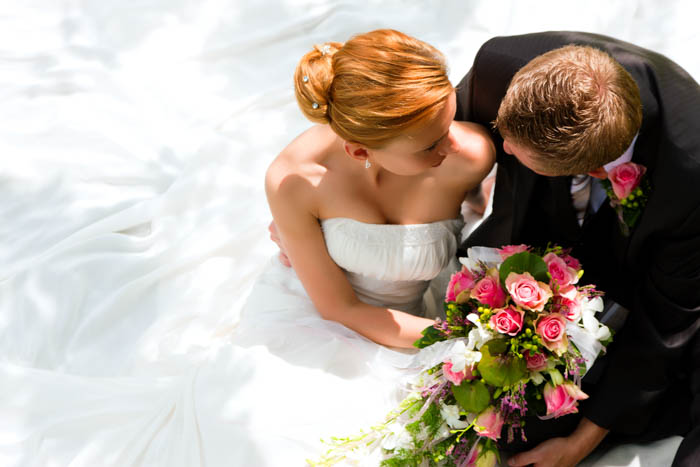 A photograph taken from above utilising the wedding dress to fill the frame