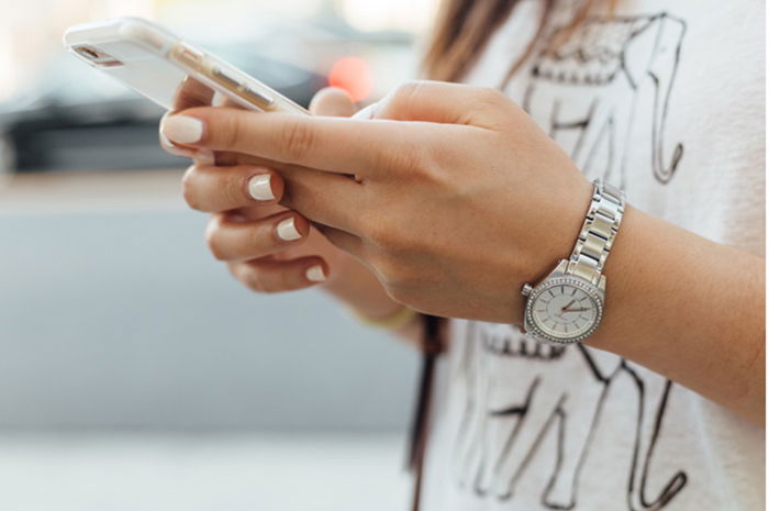 woman using smartphone