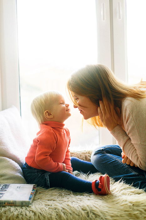 family poses mother and child looking into each others eyes