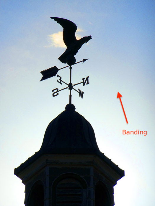 Weather vane silhouette JPEG showing banding in sky