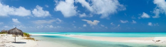 a stitched photo of a beach panorama