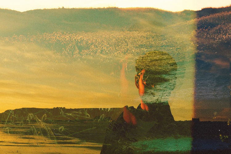 double exposure of a portrait and landscape