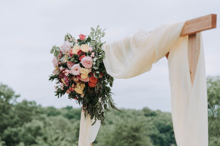 an image of the top of a DIY Curtain Wedding Photo Booth