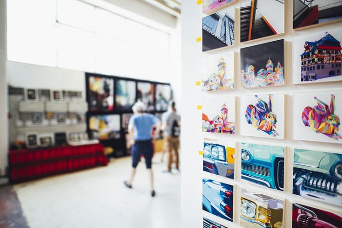 art gallery with graphic images in the foreground and blurry background