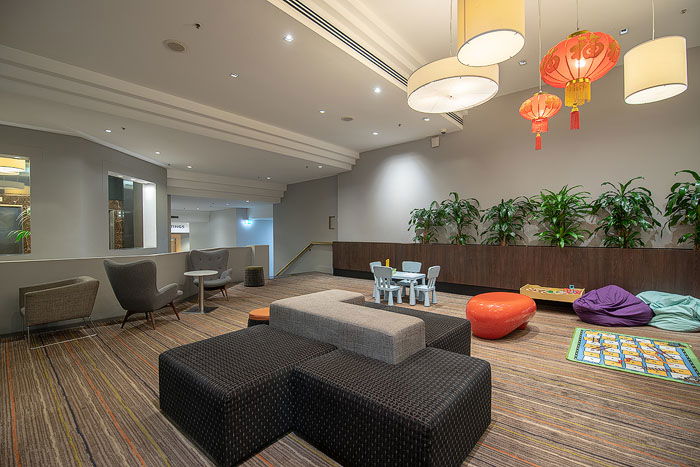 A spacious hotel lobby interior lounge area shot for real estate photography