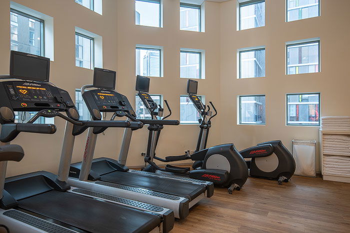 Exercise machines in the interior of a gym shot for real estate photography