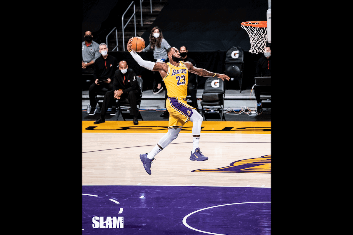 Basketball player Lebron James going for a slam dunk taken by one of the best sports photographers Cameron Look