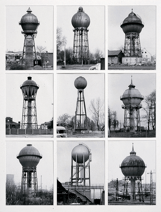 A black and white typology of nine water towers in a grid by Hilla and Bernd Becher, famous architectural photographers