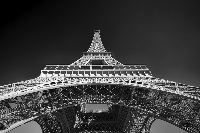 city photography: Black and white wide-angle shot of the Eiffel Tower looking up