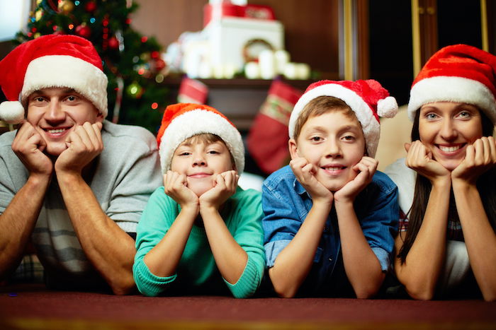 Family wearing matching Christmas clothes for Christmas card photo ideas