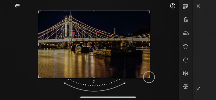 Lightroom Mobile screenshot of rotating an image by dragging a corner handle