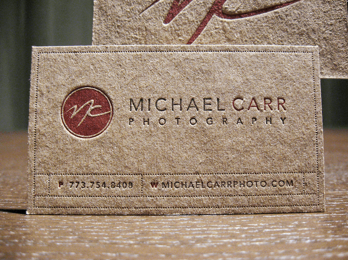 rustic business card made of a brown rough textured material for photographers