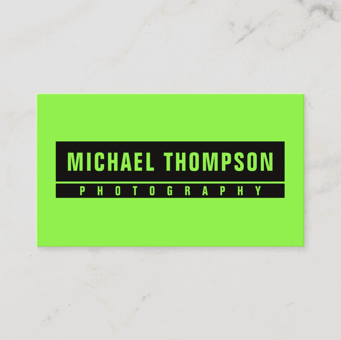 a vibrant neon green fluorescent photography business card design