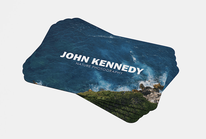 Photography business card designs where the sea takes up most of the business card 