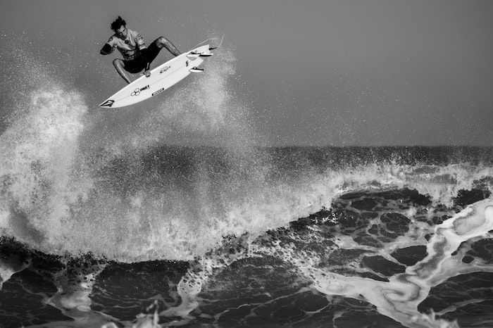 surfing men photographed in the ocean