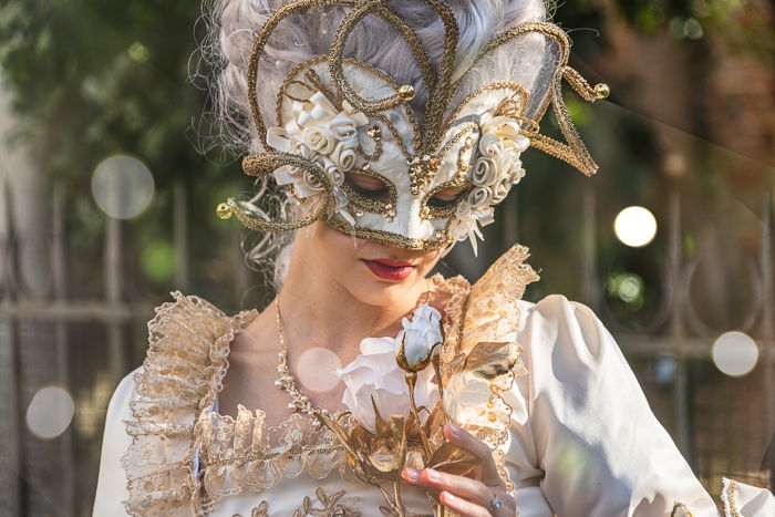 Venice masked model with dreamy fake bokeh