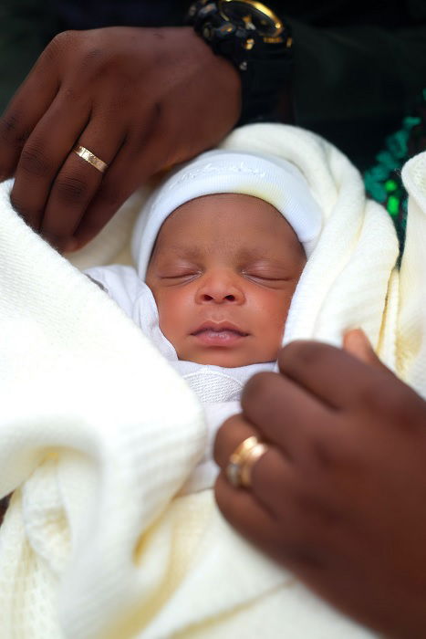 Newborn photo idea of a baby wrapped in blankets