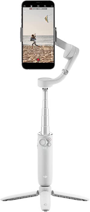 DJI OM 5 smartphone gimbal extended on tripod base