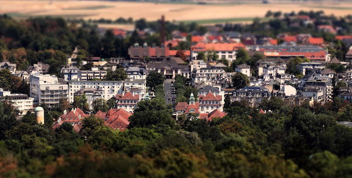 A miniature shot of houses that makes them look like tiny models