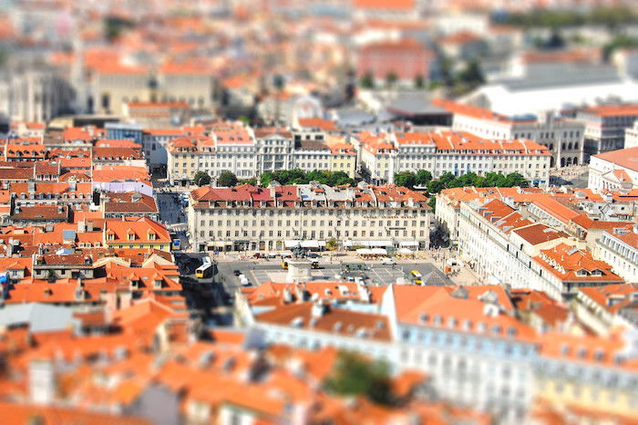 A miniature town square with an old city around it