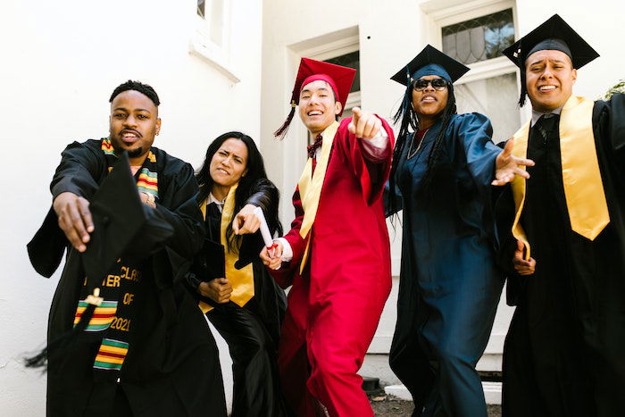 senior picture idea with high school senior graduates posing together at school