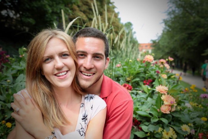 Couple looking at camera heads together