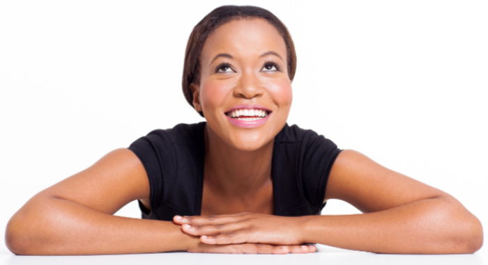 Woman leaning forward on a desk