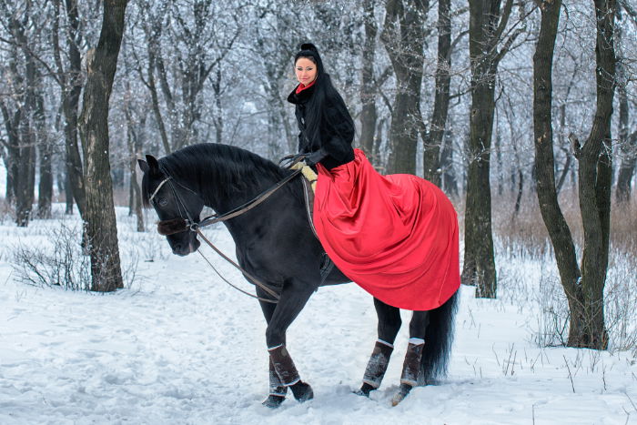 Woman sitting on horse