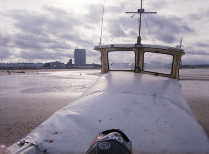 A moored boat on a cloudy day