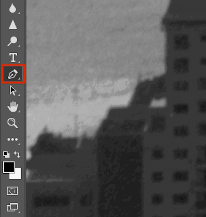 An image editor, which has a black and white photo of a cityscape with a skyscraper, and a toolbar on the left side. 