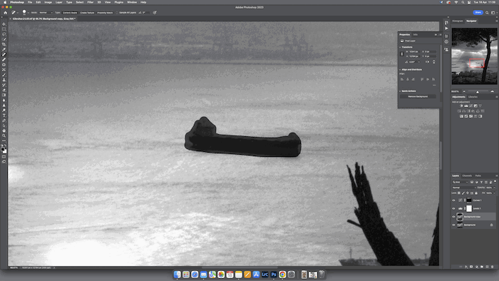 A photo editing software, showcasing an old boat near a dock and a body of water. 